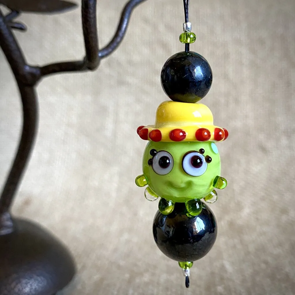 Hangable Shungite Accessory, Lime Green "Squeedle" in Yellow Hat